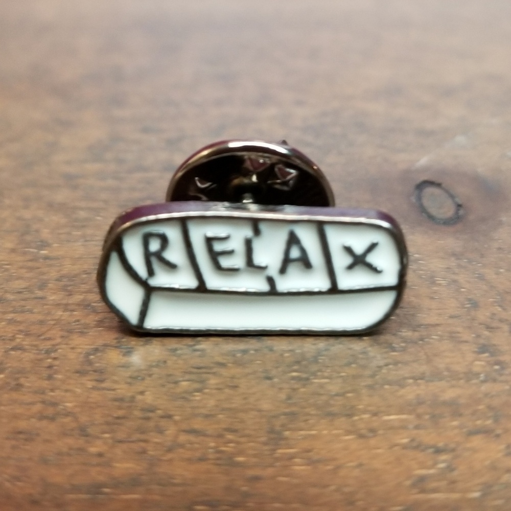 Relax Chill Pill silver and white enamel pin